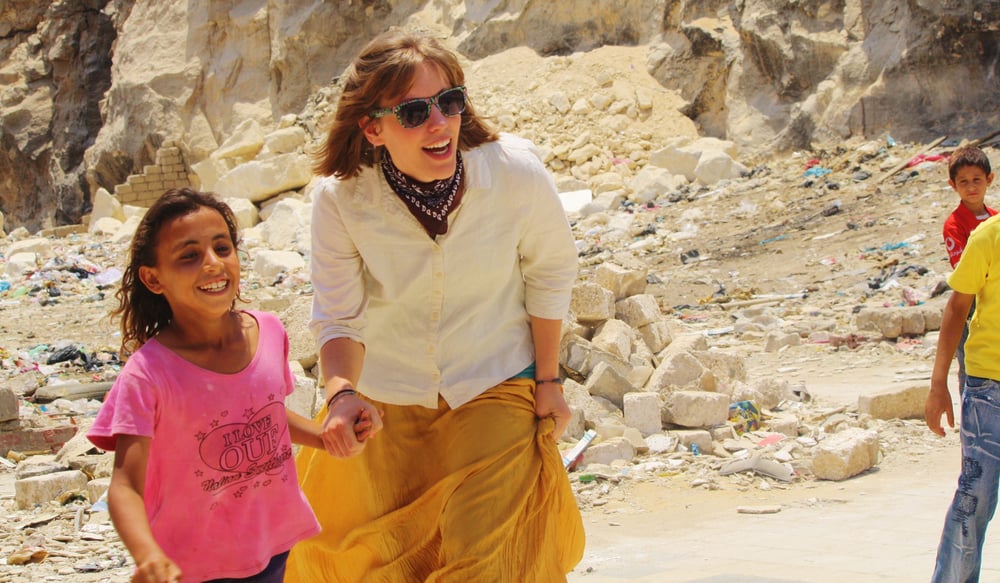 dts student on outreach with little girl